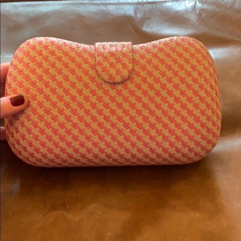 Pink and ivory woven clutch